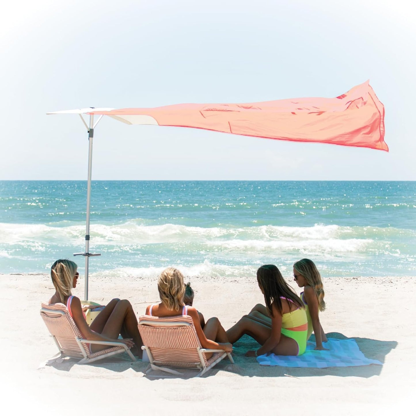 Solbello® Shade - The ultimate Wind-Driven® beach umbrella. Effortless to set up, lightweight, won't blow down the beach, UPF 50+ sun protection