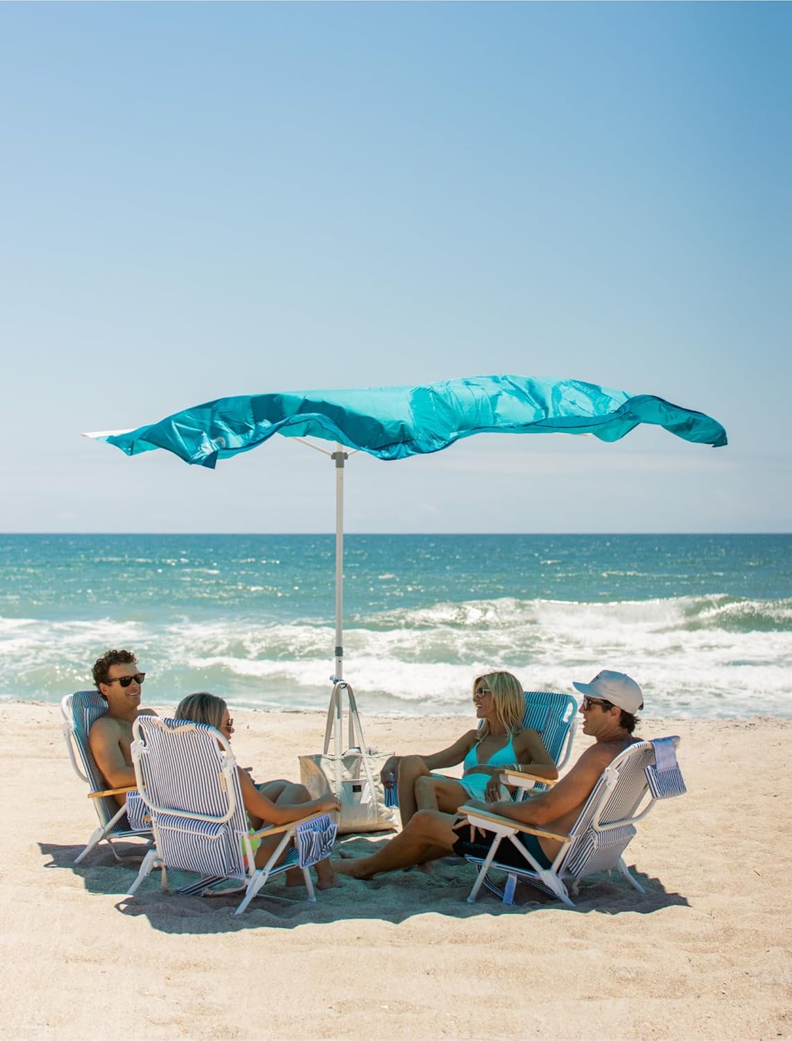 Solbello® Shade - The ultimate Wind-Driven® beach umbrella. Effortless to set up, lightweight, won't blow down the beach, UPF 50+ sun protection