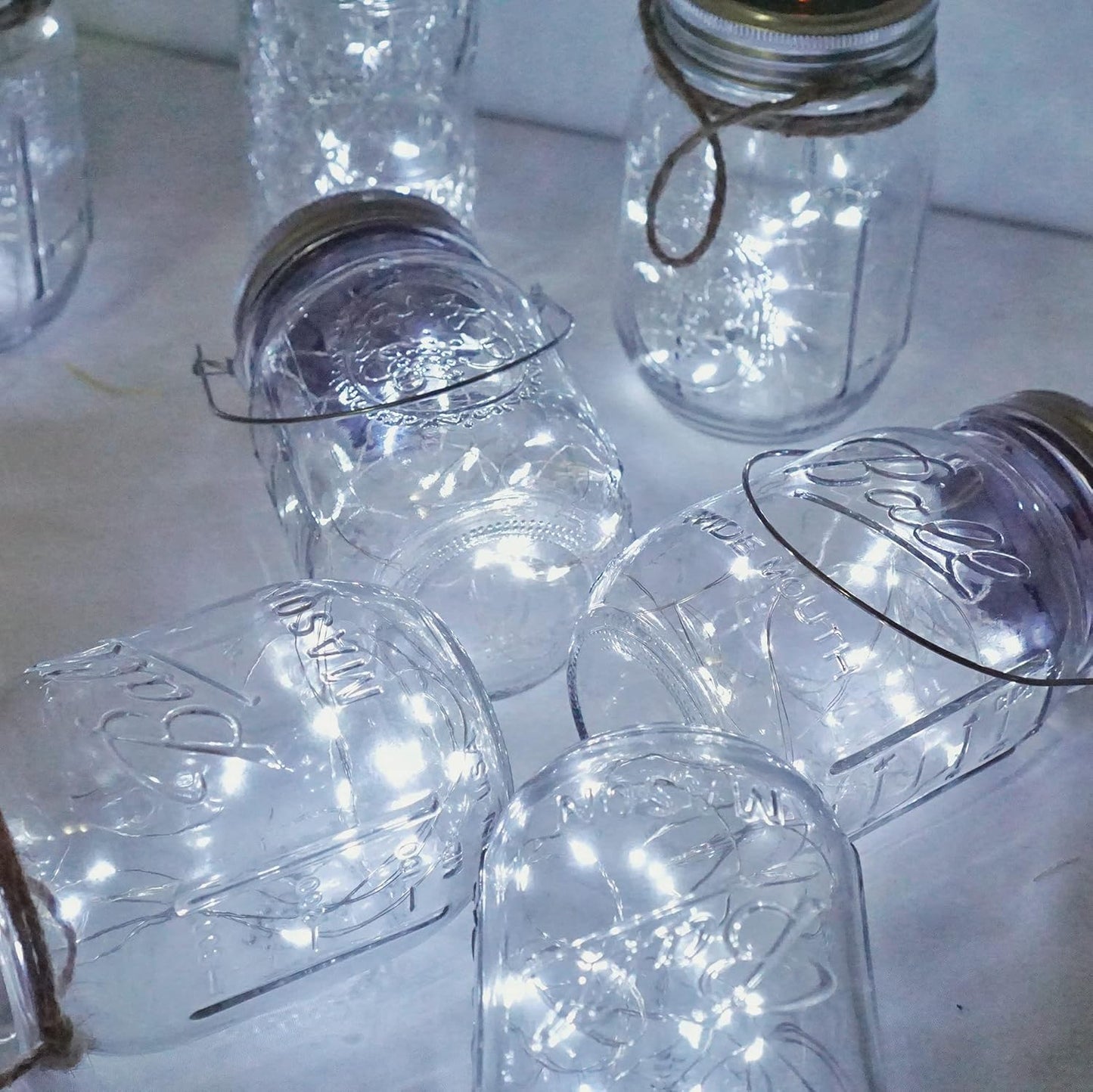 Decorman Solar Mason Jar Lights, 4 Pack 30 LED Fairy Star Firefly String Lids Lights with 4 Hangers for Patio Yard Garden Party Wedding Christmas Decoration(Jars Not Included) (4 Pack, Cool White)